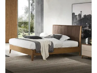 Letto Nirvana in legno con testiera in pelle di Le Fablier